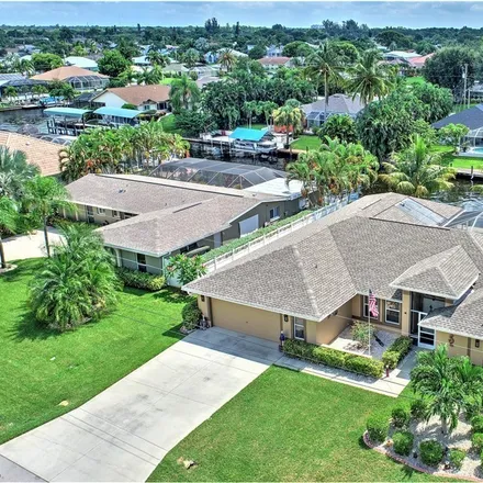 Buy this 4 bed house on 1045 Southeast 20th Avenue in Cape Coral, FL 33990