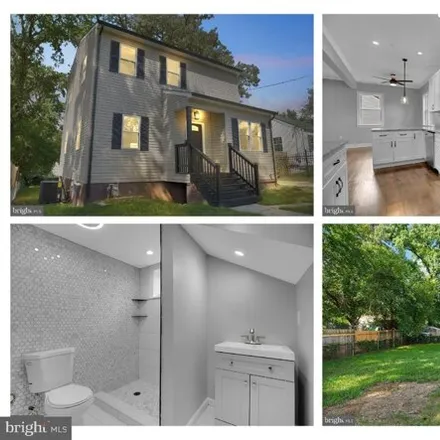 Buy this 5 bed house on 5222 57th Ave in Riverdale, Maryland