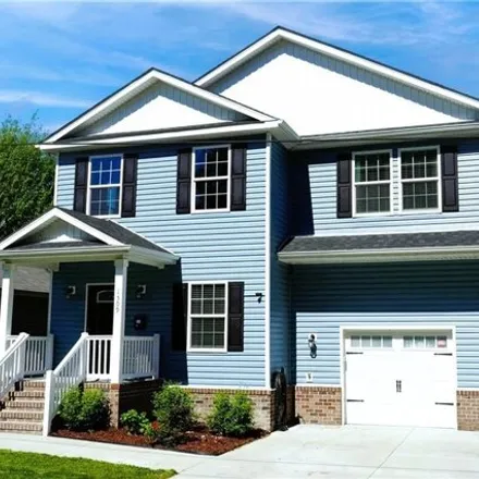 Buy this 4 bed house on 1509 Melon Street in Norfolk, VA 23523