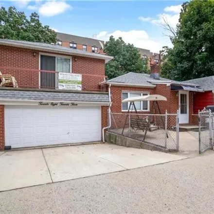 Buy this 4 bed house on 2823 Ford Street in New York, NY 11235