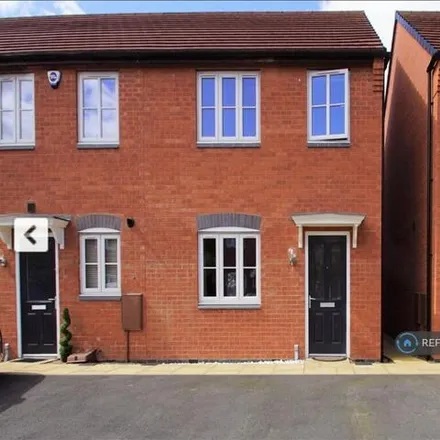 Rent this 3 bed townhouse on Lanchester Court in Academy Drive, Rugby