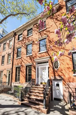 Buy this 6 bed townhouse on 25 Charlton Street in New York, NY 10014