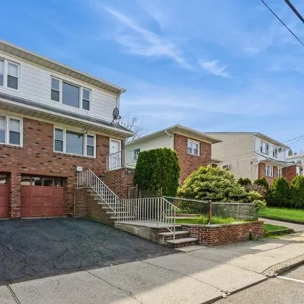 Buy this 4 bed house on 8860 Columbia Avenue in Hudson Heights, North Bergen