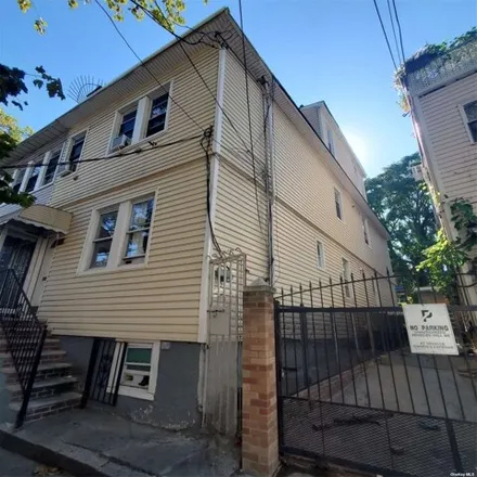 Buy this 8 bed house on 33-30 109th Street in New York, NY 11368