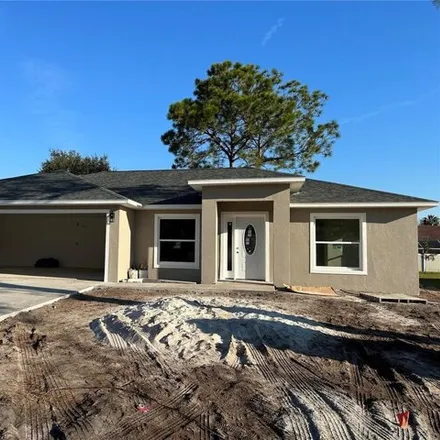 Buy this 4 bed house on 80 Buffalo Bill Drive in Palm Coast, FL 32137