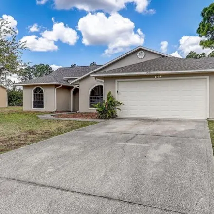 Buy this 3 bed house on 1438 Amador Avenue Northwest in Palm Bay, FL 32907