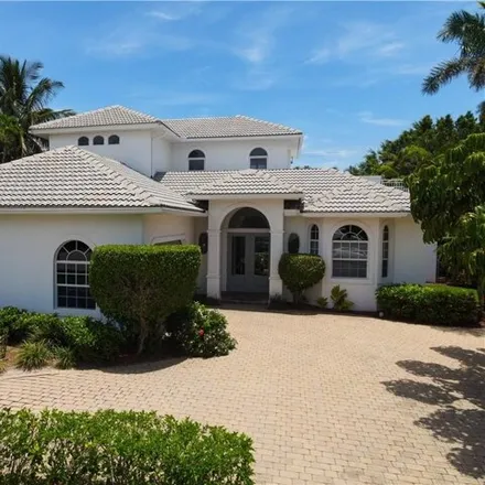 Rent this 4 bed house on 584 South Golf Drive in Naples, FL 34102