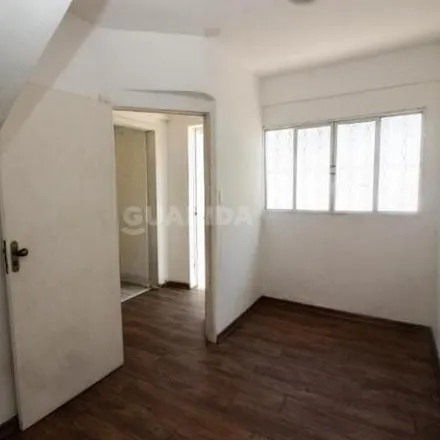 Rent this 4 bed house on Clínica Santto Sorriso Odontológica in Rua Guilherme Alves 1245, Partenon