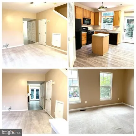 Rent this 3 bed townhouse on 21057 Pickerelweed Terrace in Ashburn, VA 20147