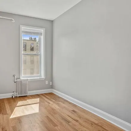 Rent this 2 bed townhouse on 156 East 109th Street in New York, NY 10029