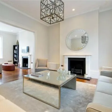 Buy this 6 bed townhouse on 21 Warwick Gardens in London, W14 8PR