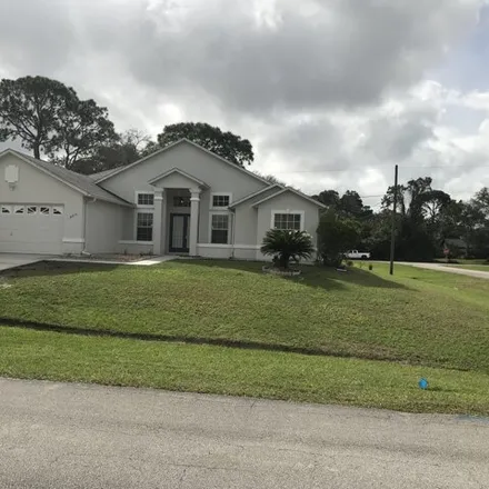 Rent this 3 bed house on Bikas Lane Southeast in Palm Bay, FL 32909