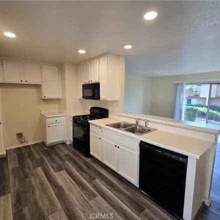 Rent this 1 bed condo on 1365 Crafton Ave Apt 1060 in Mentone, California