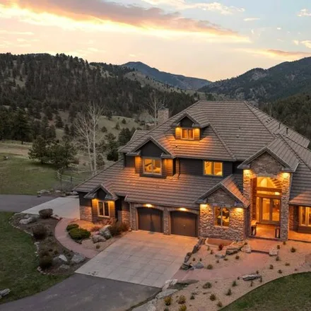 Buy this 5 bed house on 25518 Elk Range Road in Jefferson County, CO 80439