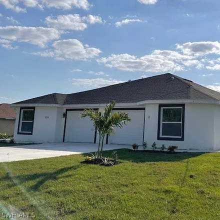 Rent this 3 bed house on 2157 Zaharihas Drive in Lehigh Acres, FL 33973