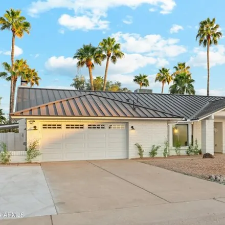 Buy this 4 bed house on 7489 East Windrose Drive in Scottsdale, AZ 85260