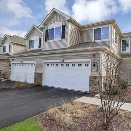 Buy this 2 bed townhouse on Fidler Court in Aurora, IL 60502