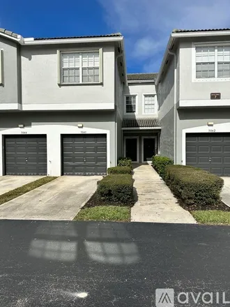 Rent this 3 bed townhouse on 3041 Grandiflora Dr