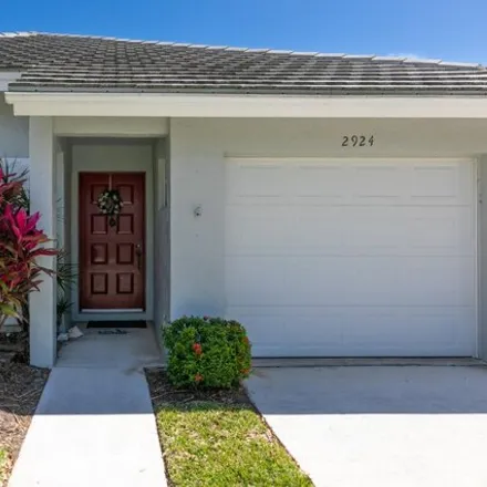 Buy this 2 bed house on 2932 Southwest Westlake Circle in Palm City, FL 34990