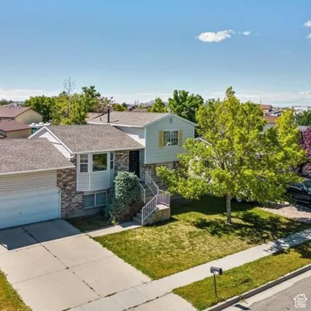 Buy this 4 bed house on 2972 Winston Drive in West Valley City, UT 84128