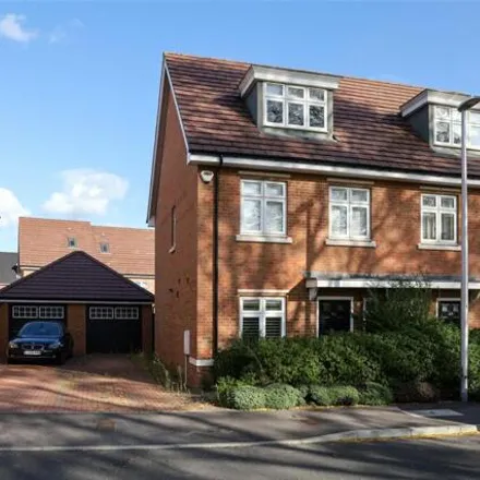 Buy this 4 bed townhouse on Faringdon Road in Woodley, RG6 1FP