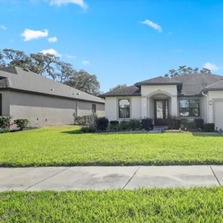 Buy this 4 bed house on 694 Chalice Creek in Spring Hill, FL 34609