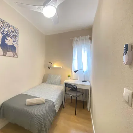 Rent this 5 bed room on Calle del Pico de Alba in 4, 28053 Madrid