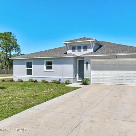 Buy this 3 bed house on Serbian Bellflower Trail in Palm Coast, FL 32136