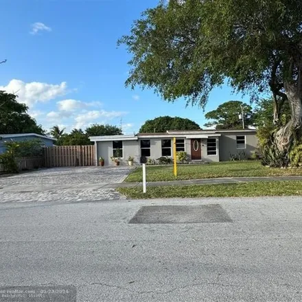 Buy this 4 bed house on 1999 Northeast 53rd Court in Pompano Beach, FL 33064