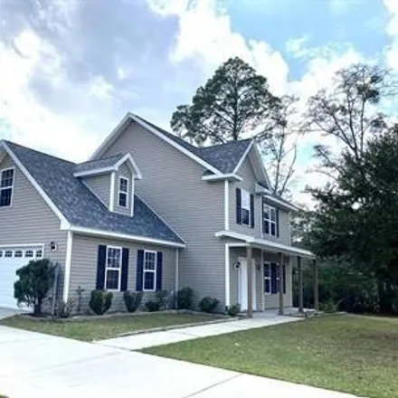 Rent this 4 bed house on 293 Palmer Lane in Evergreen, Hinesville