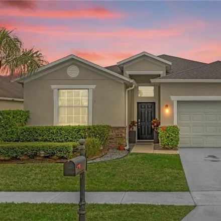 Rent this 4 bed house on 14365 Queenside St in Orlando, Florida