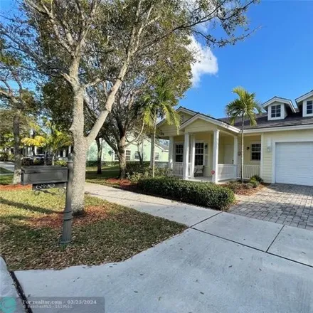 Rent this 4 bed house on 6937 Lakeside South Circle in Davie, FL 33314
