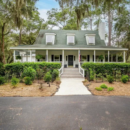 Buy this 4 bed house on 8 Dolphin Point Drive in Beaufort County, SC 29907