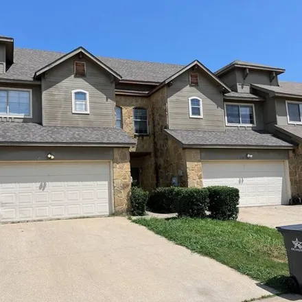 Rent this 4 bed house on West Abram Street in Arlington, TX 76012
