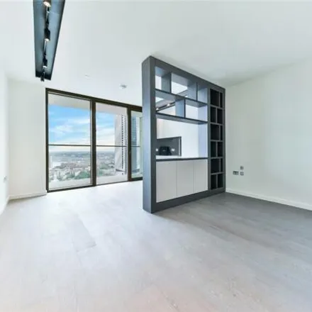 Rent this studio loft on One Park Drive in 1 Park Drive, London