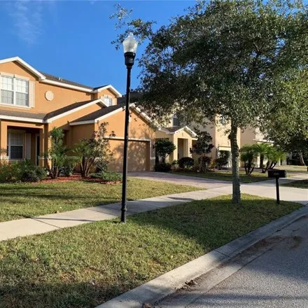 Rent this 4 bed house on 8822 Cameron Crest Drive in Americana, Citrus Park
