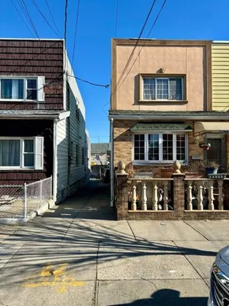 Buy this 4 bed house on 927 East 87th Street in New York, NY 11236