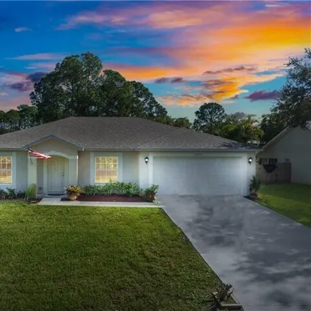 Buy this 3 bed house on 2625 Ace Avenue Southeast in Palm Bay, FL 32909