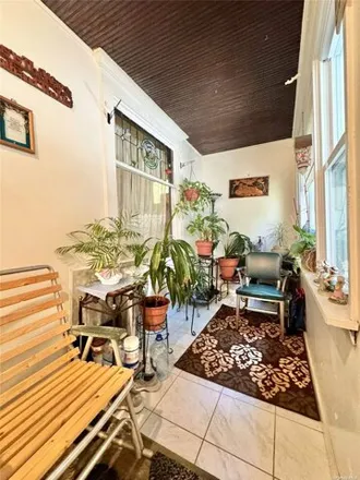 Image 3 - 88-43 75th Street, New York, NY 11421, USA - House for sale