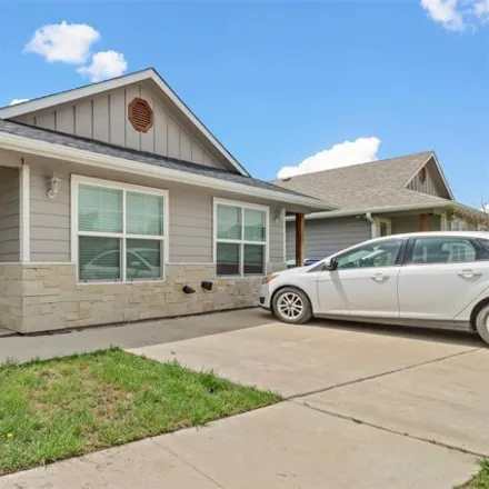 Rent this 3 bed house on 818 North Broughton Street in Sherman, TX 75090