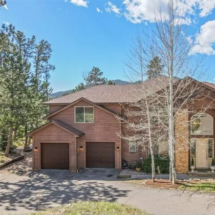 Buy this 5 bed house on 26216 Sweetbriar Trail in Kittredge, Evergreen