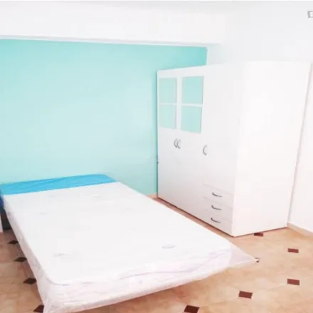 Rent this 3 bed room on Carrer del Pintor Cabrera in 46035 Valencia, Spain