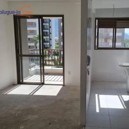 Buy this 2 bed apartment on Rua Nilo Braga garcez in Jardim Bela Vista, Caraguatatuba - SP