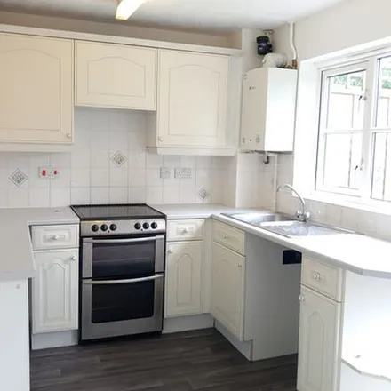 Rent this 2 bed townhouse on Badger's Way in Bovey Tracey, TQ13 9QY