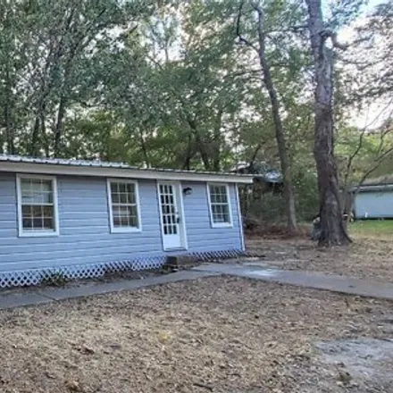 Rent this 2 bed house on 6197 Cessna Dr in Montgomery, Texas