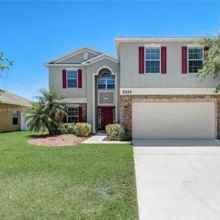 Buy this 5 bed house on 5223 Northwest Wisk Fern Circle in Port Saint Lucie, FL 34986