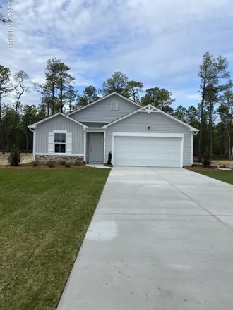Rent this 3 bed house on 77 Cougar Road in Boiling Spring Lakes, Brunswick County