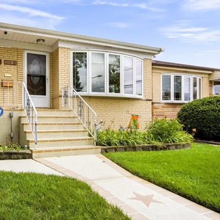 Buy this 4 bed house on 5037 North Mason Avenue in Chicago, IL 60630