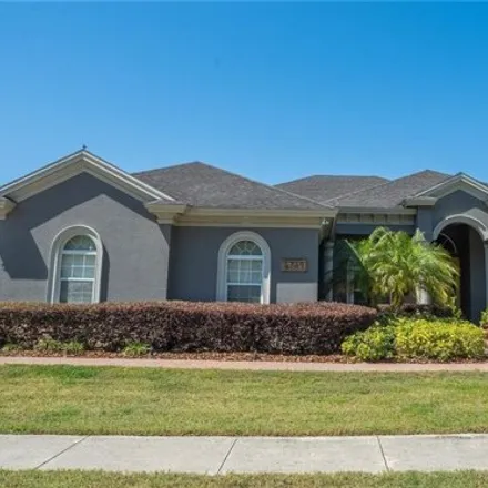 Buy this 5 bed house on 6789 Crescent Woods Circle in Polk County, FL 33813