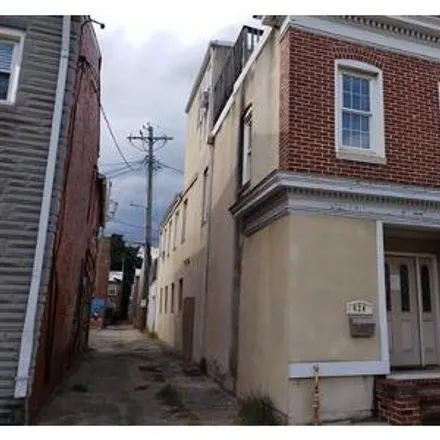 Buy this 4 bed house on 1934 Eastern Avenue in Baltimore, MD 21231